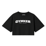 Frente de crop top negro con el logotipo blanco GYMKER EST. 2020.