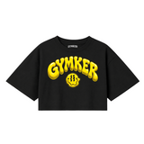 Crop top negro GYMKER Yellow Smile con letras y carita sonriente amarillas en el frente.