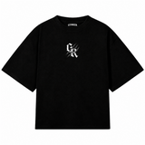 Frente común de las playeras oversize BEAST MODE GYMKER: playera negra con monograma blanco en el pecho.