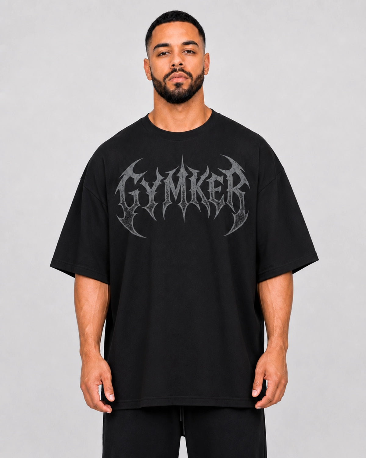 Referencia de fit más amplio de playera oversize Gymker